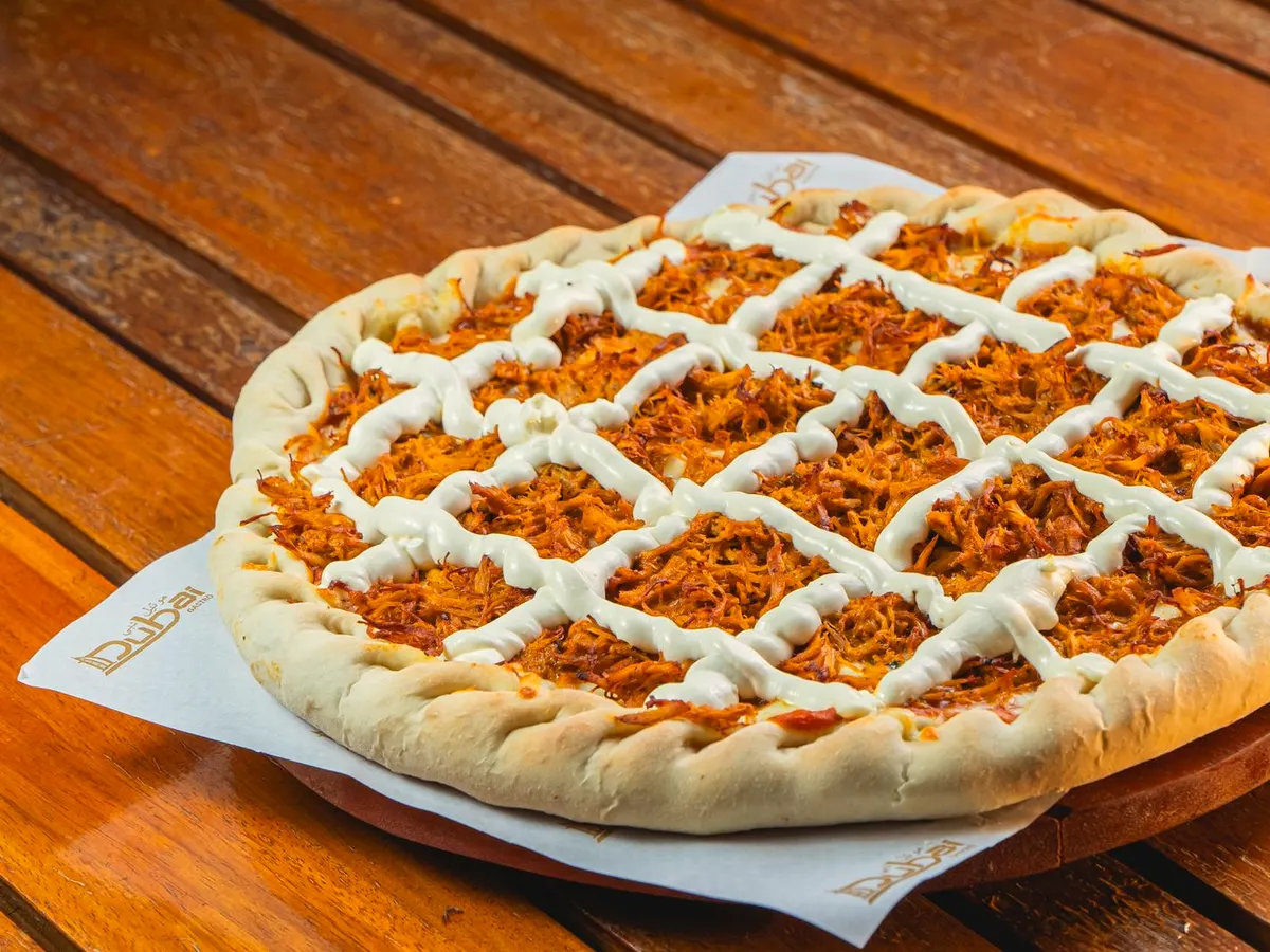 Pizza Sezonowa: Gyros — kurczak marynowany w przyprawach, mozzarella, papryka